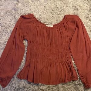 A off the shoulder pink blouse